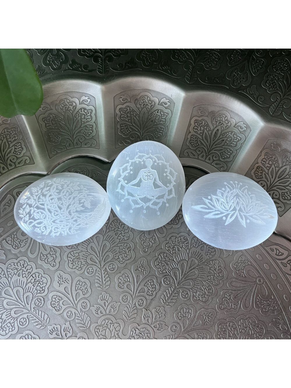 Etched selenite palm stone